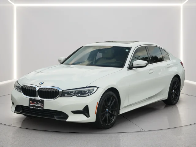 Used 2021 White BMW 330i xDrive image 1