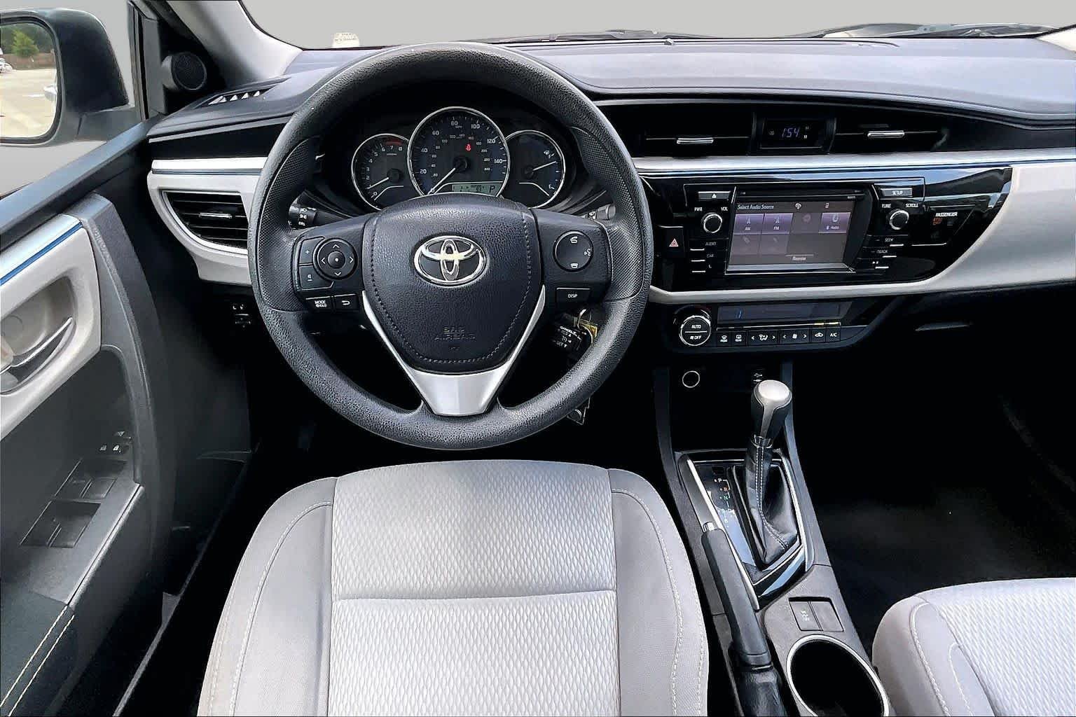 Used 2016 Classic Silver Metallic Toyota LE image 6