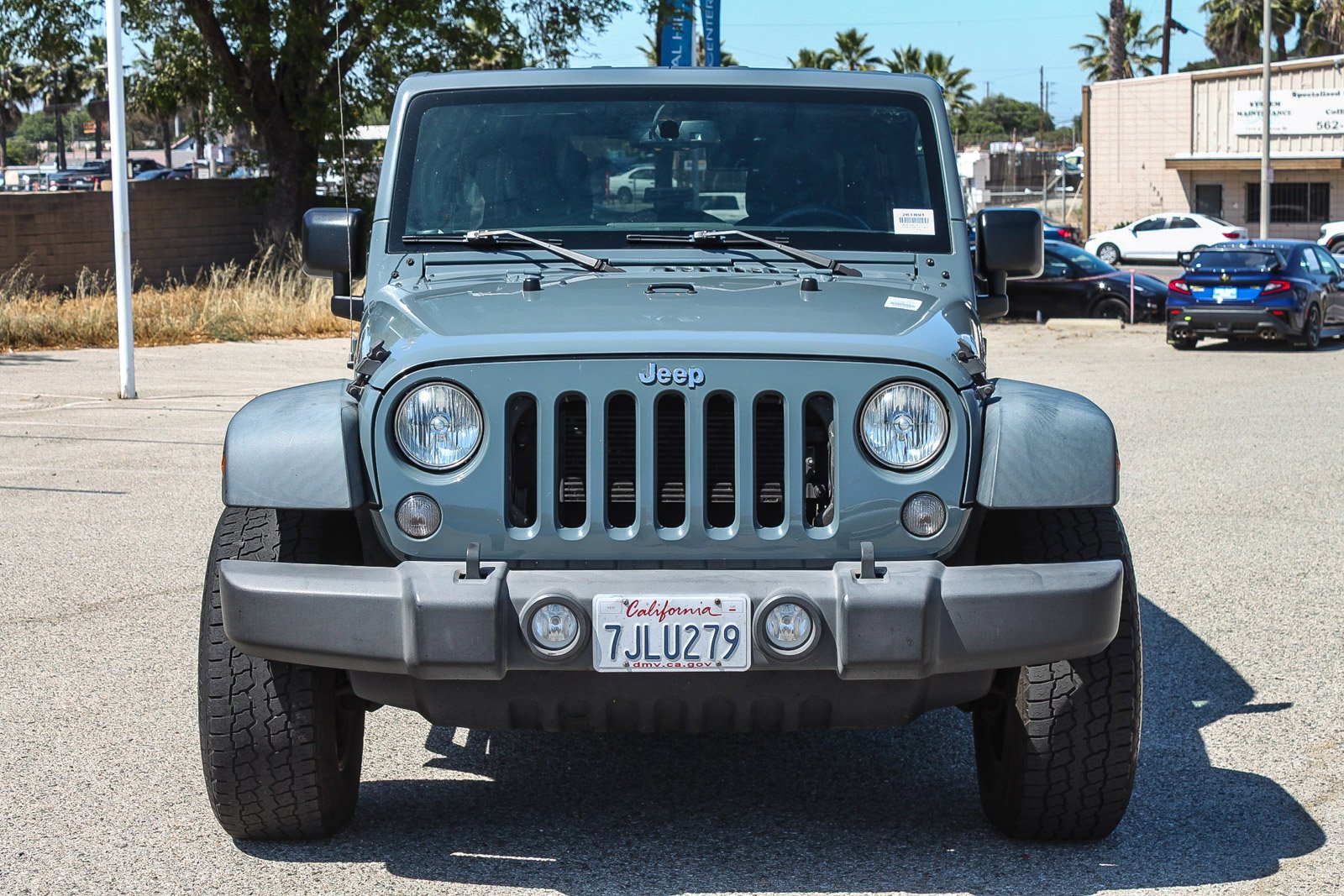 Used 2015 Jeep Wrangler Unlimited Sport with VIN 1C4BJWDG5FL551371 for sale in Signal Hill, CA