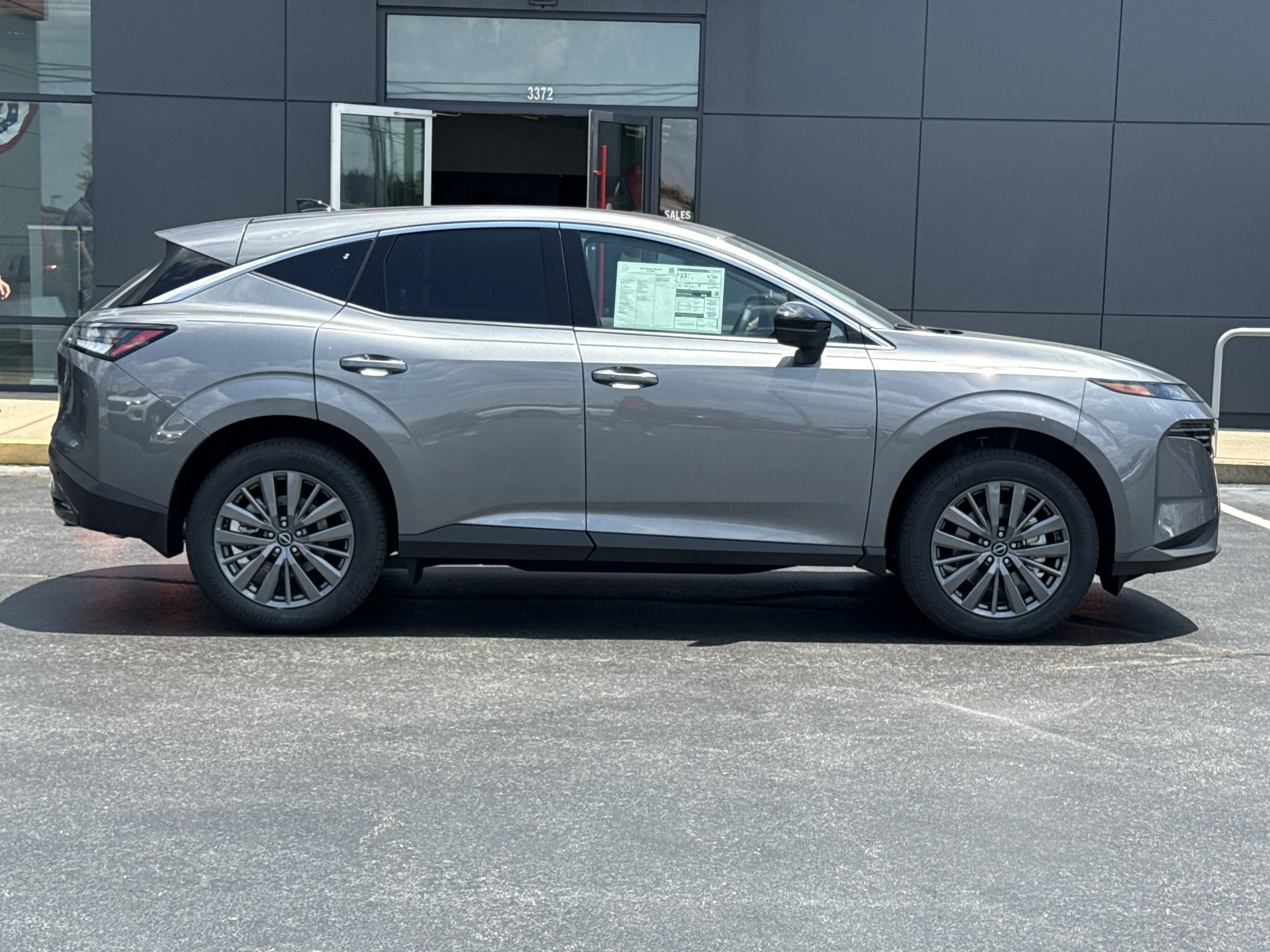 New 2026 Gun Metallic Nissan SL AWD image 2