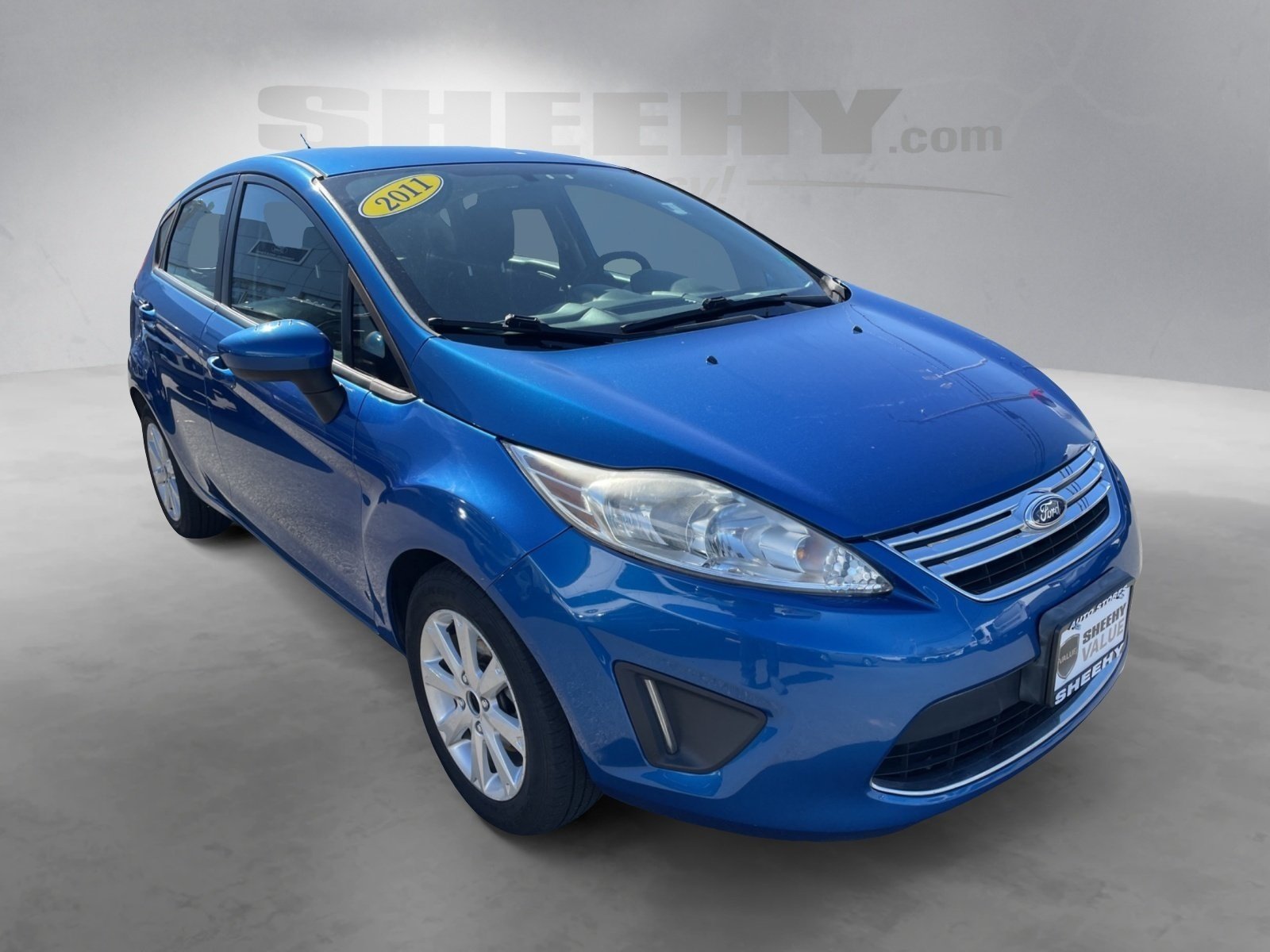 Used 2011 Ford Fiesta SE with VIN 3FADP4EJ2BM122841 for sale in Springfield, VA