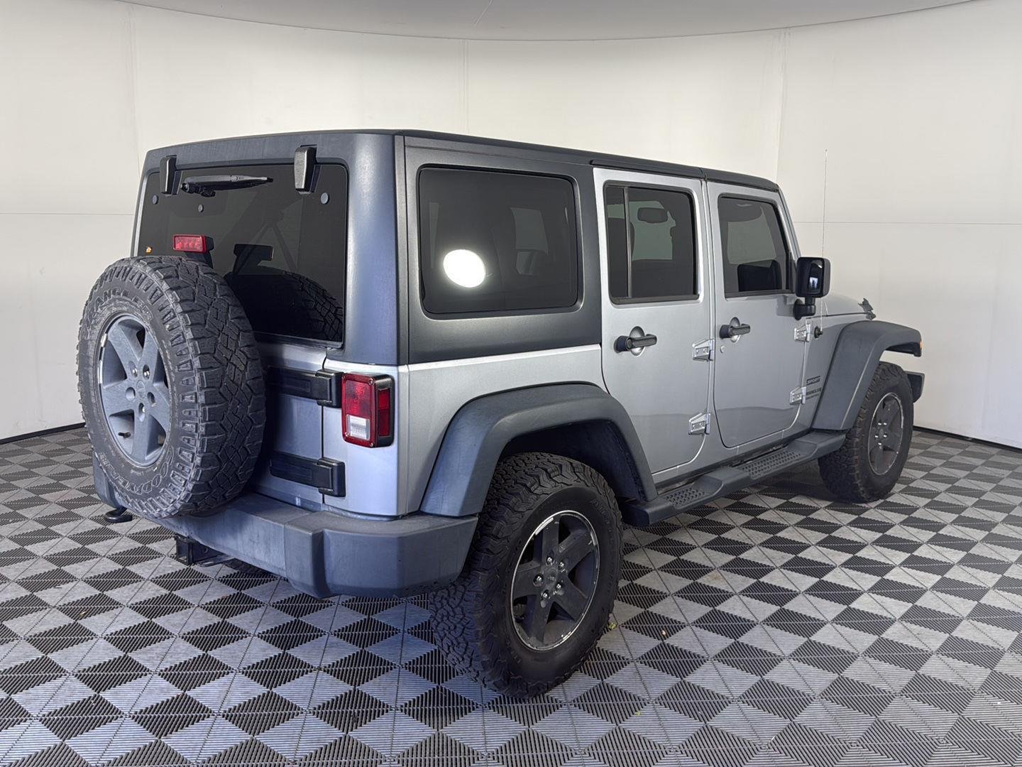 Used 2013 Billet Silver Metallic Jeep Sport image 4