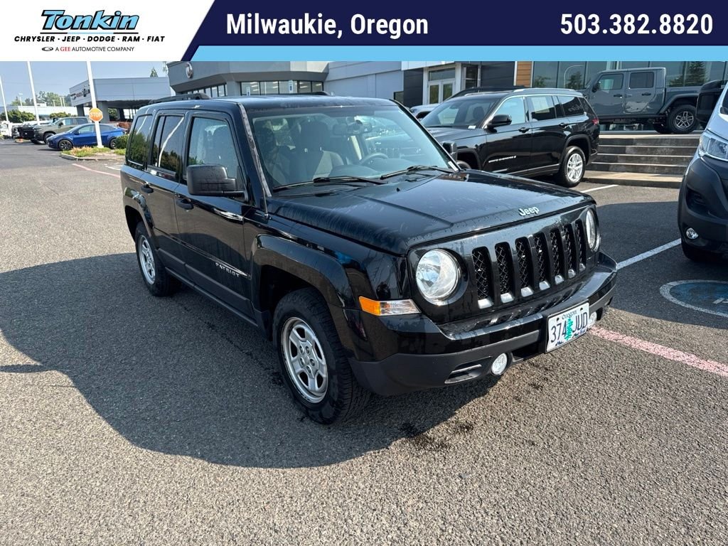 Used 2017 Black Clearcoat Jeep Sport image 1
