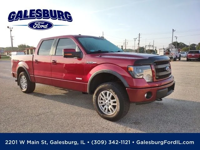 Used 2014 Ruby Red Metallic Ford FX4 image 1