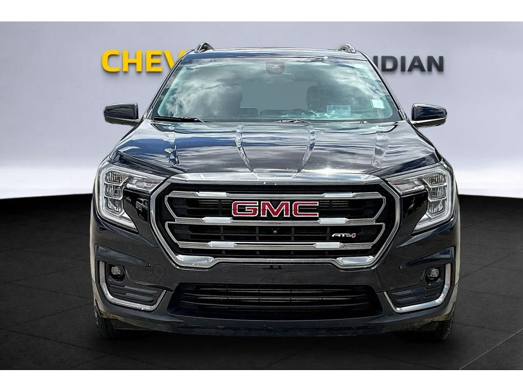 Used 2024 Ebony Twilight Metallic GMC AT4 image 3