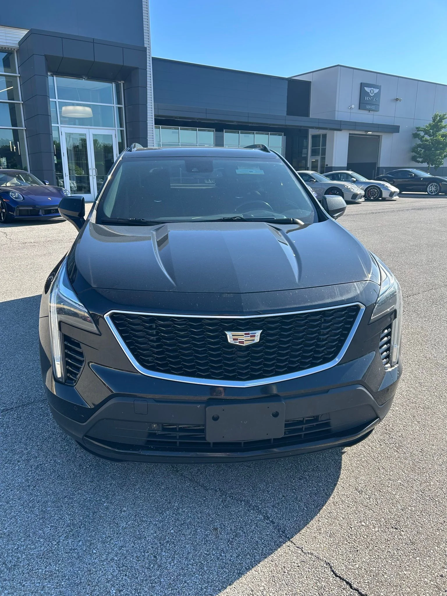 Used 2019 Black Cadillac Sport image 1