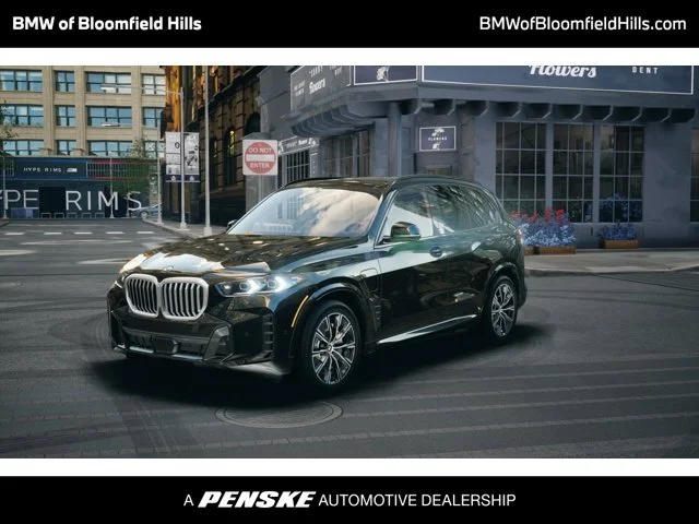 Used 2026 Black Sapphire Metallic BMW xDrive50e image 1