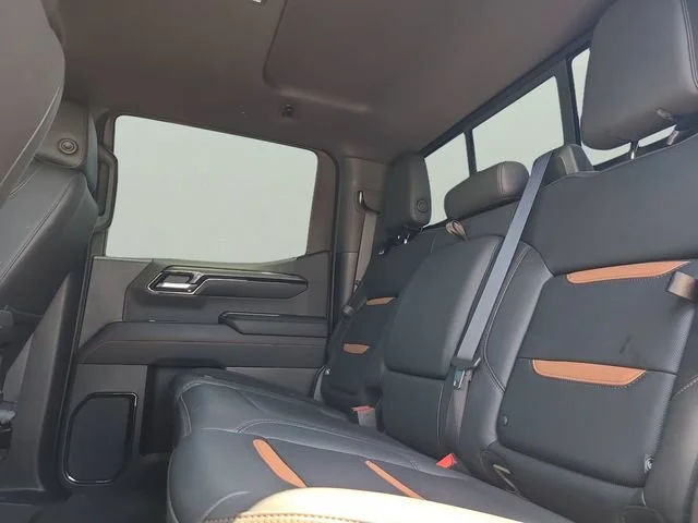 Used 2023 Desert Sand Metallic GMC AT4 image 11