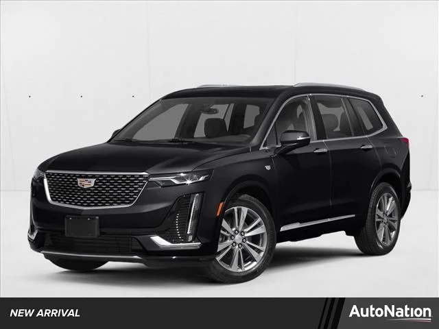 Used 2020 Stellar Black Metallic Cadillac FWD Premium Luxury image 1