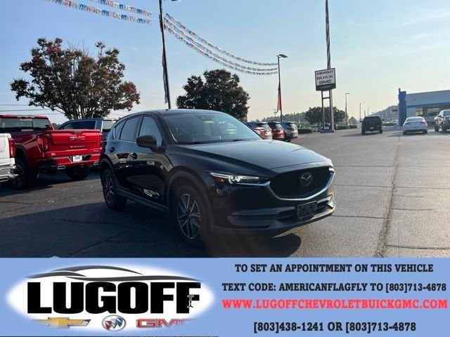 Used 2018 Black Mazda Grand Touring image 1