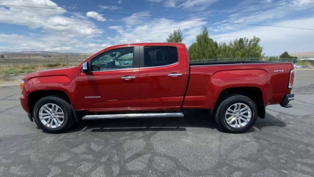 Used 2016 COPPER RED METALLIC GMC 4WD SLT image 5