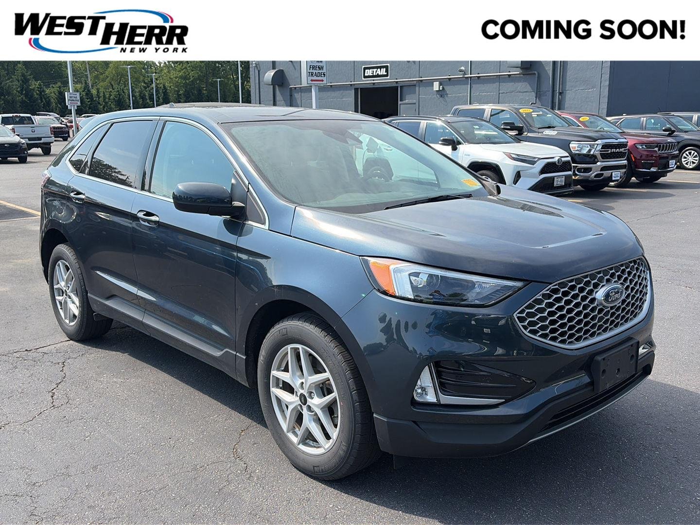 Used 2024 Stone Blue Ford SEL image 1