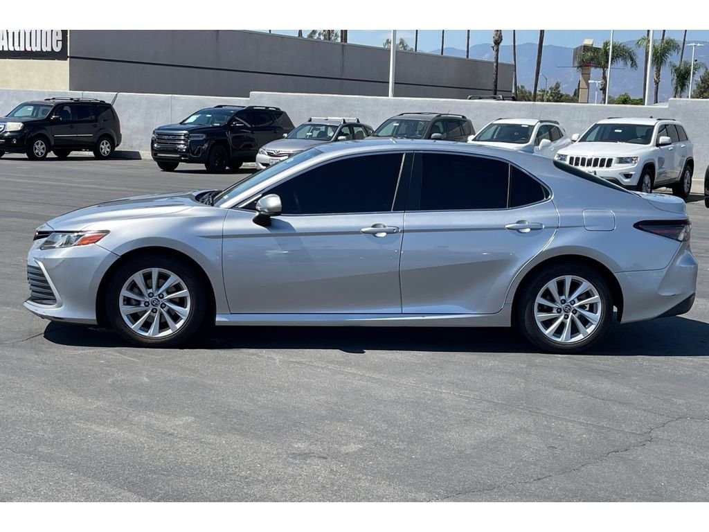 Used 2023 Celestial Silver Metallic Toyota LE image 3