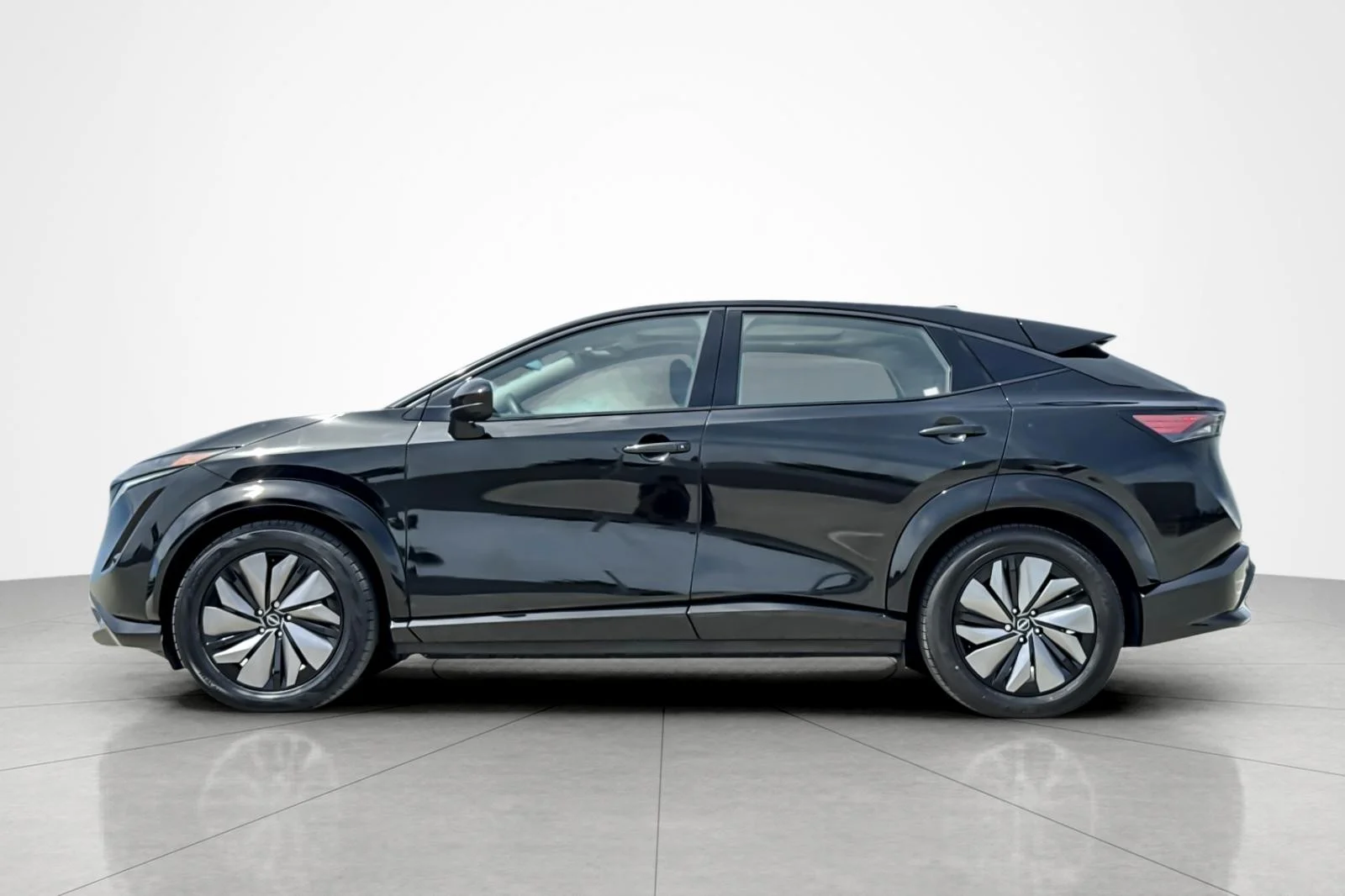 Used 2024 Black Diamond Pearl Nissan EVOLVE+ image 2