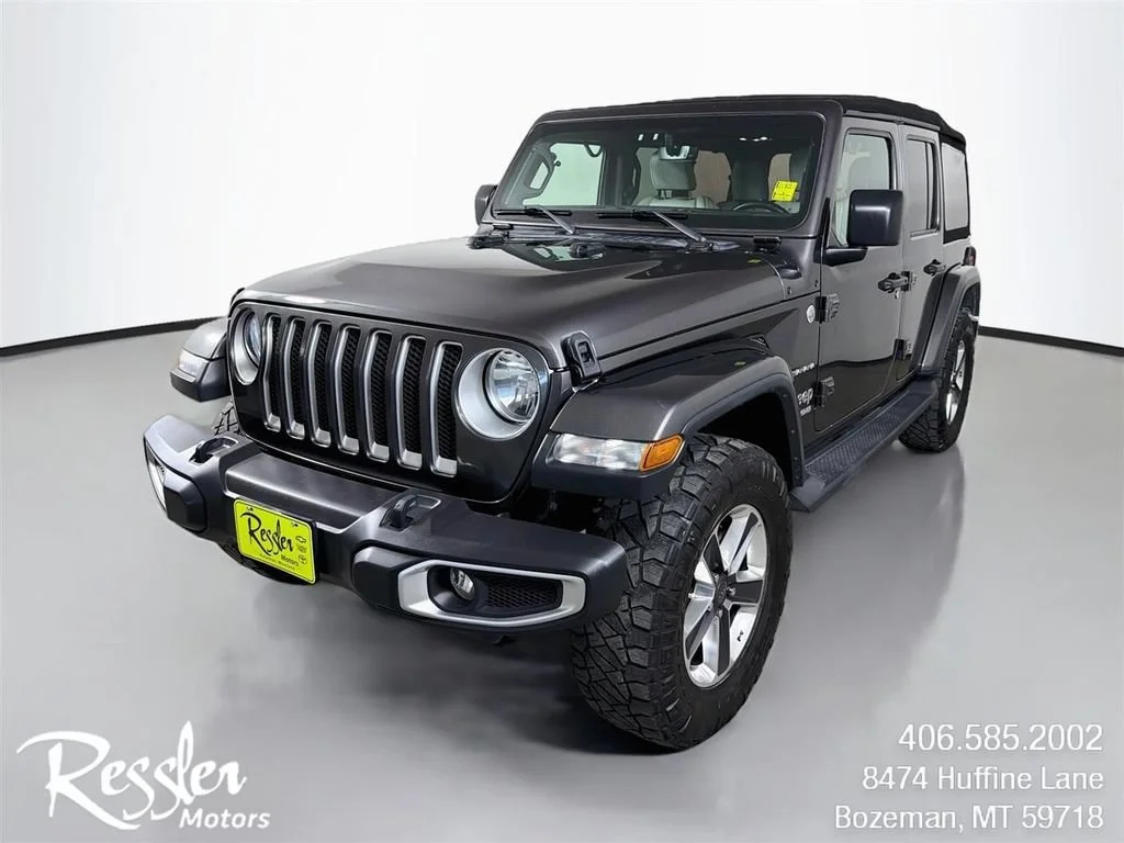 Used 2019 Granite Crystal Jeep Sahara image 1