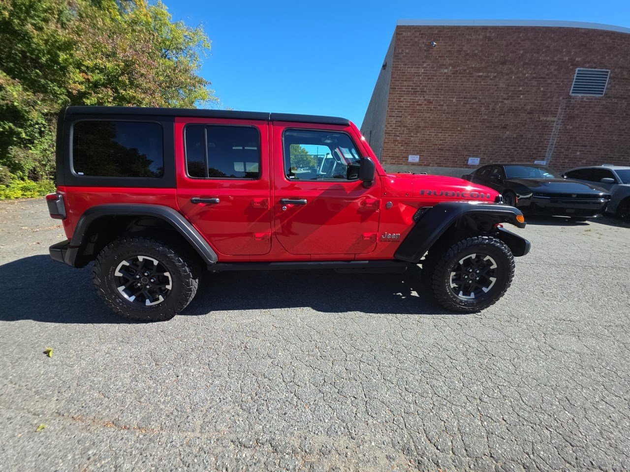 Used 2026 Firecracker Red Clearcoat Jeep Rubicon image 18