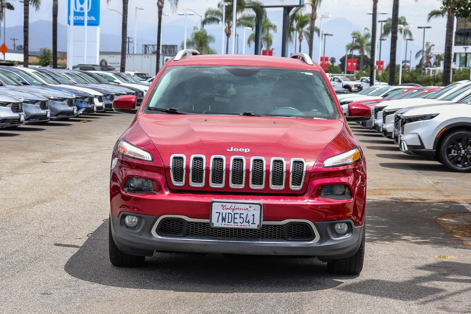 Used 2017 Deep Cherry Red Crystal Pearlcoat Jeep Limited image 2