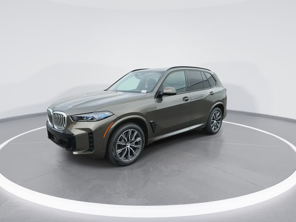 New 2026 Green Metallic BMW xDrive40i image 4