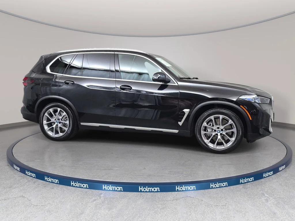 Used 2025 Black Sapphire Metallic BMW xDrive50e image 4