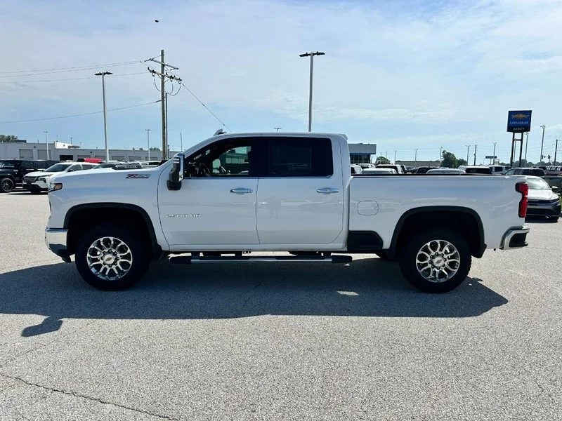 Certified Used 2025 Summit White / White Chevrolet 4WD Crew Cab 159" LTZ image 2