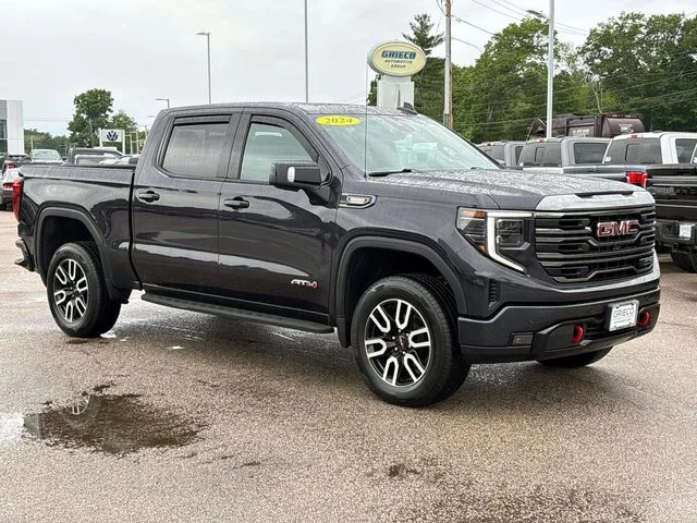 Used 2024 Titanium Rush Metallic GMC AT4 image 1