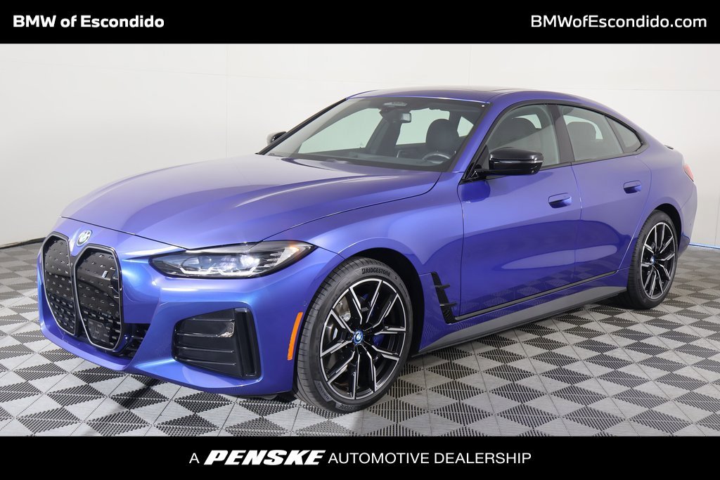 Certified Used 2023 Blue Metallic BMW eDrive40 image 1