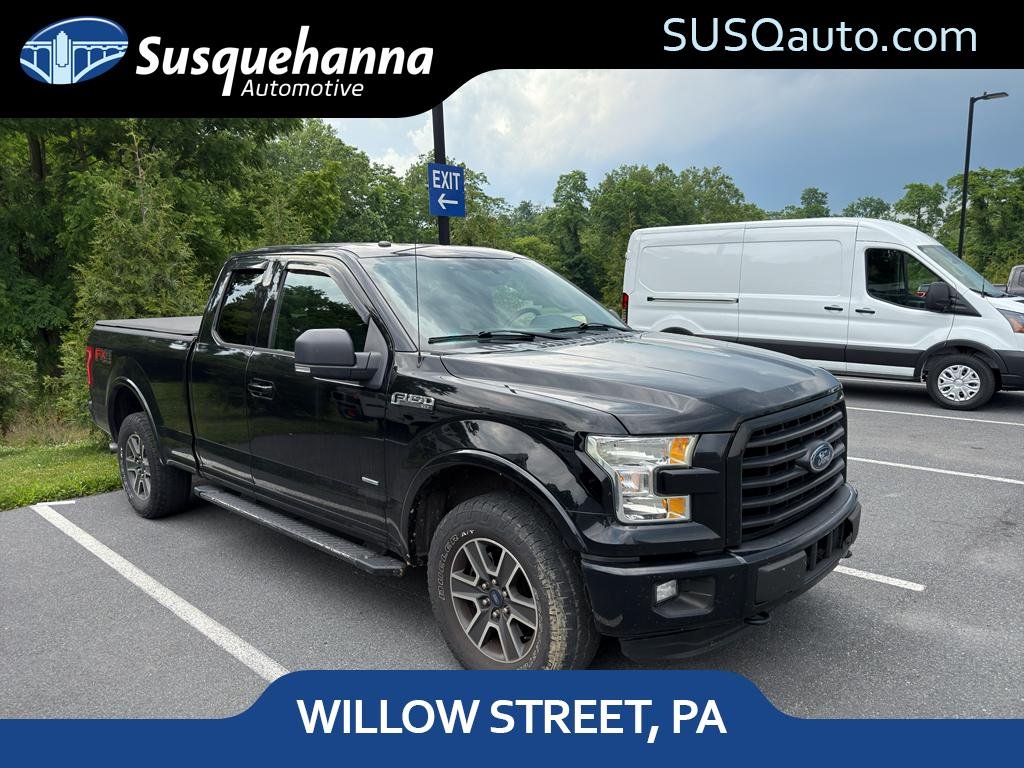 Used 2016 Shadow Black Ford Lariat image 1