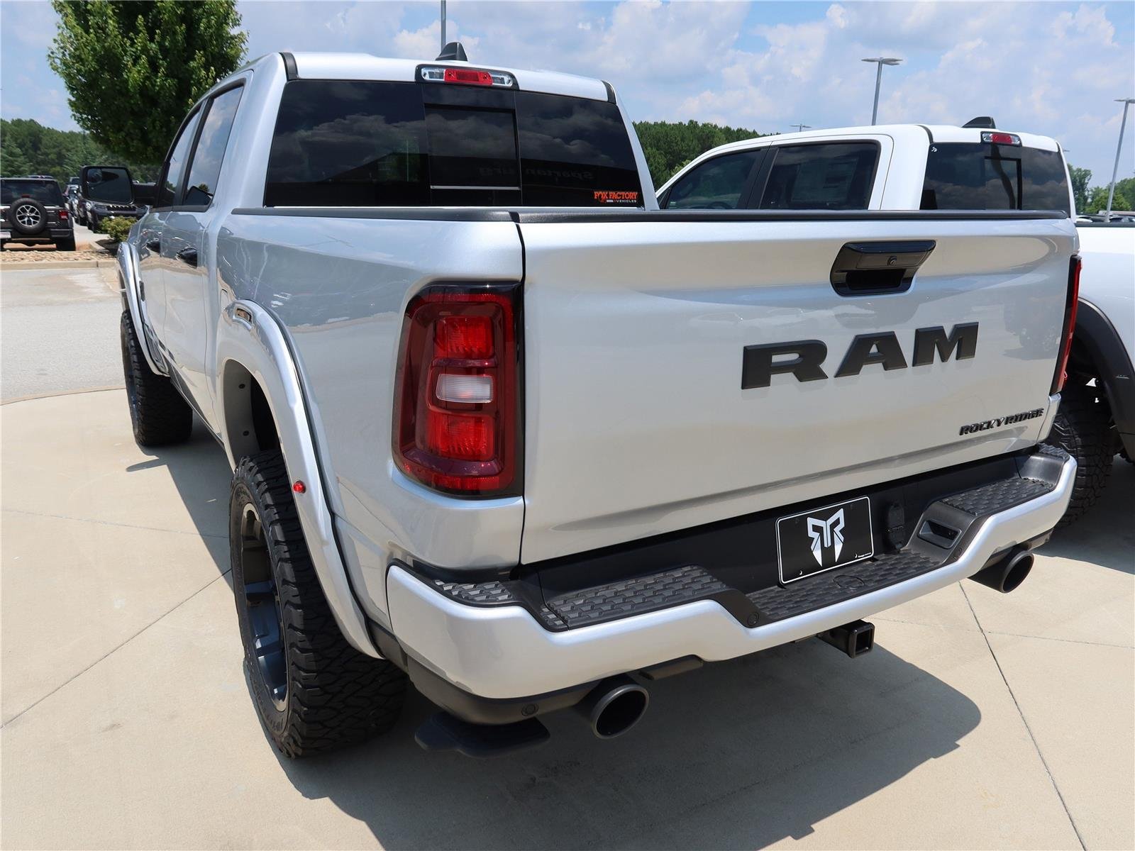 New 2026 Silver Zynith Exterior Paint RAM Laramie image 4