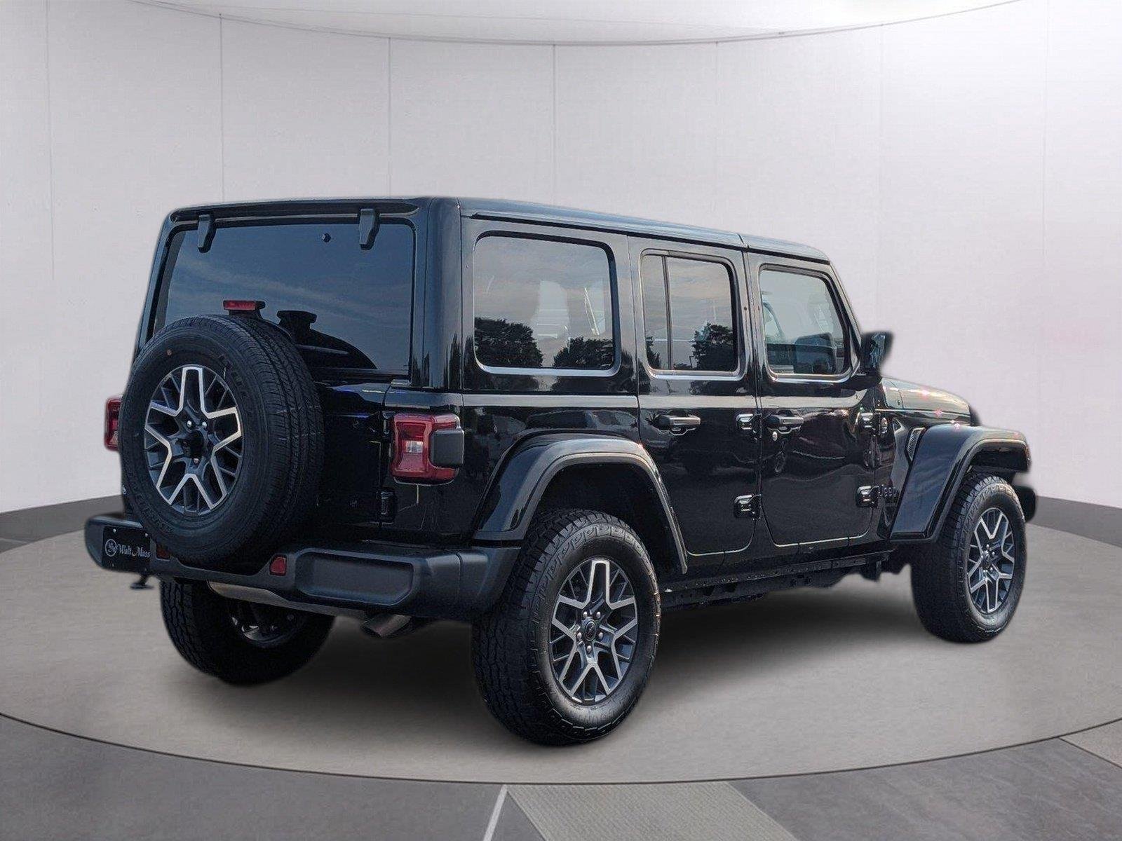 Used 2025 Black Clearcoat Jeep Sahara image 7