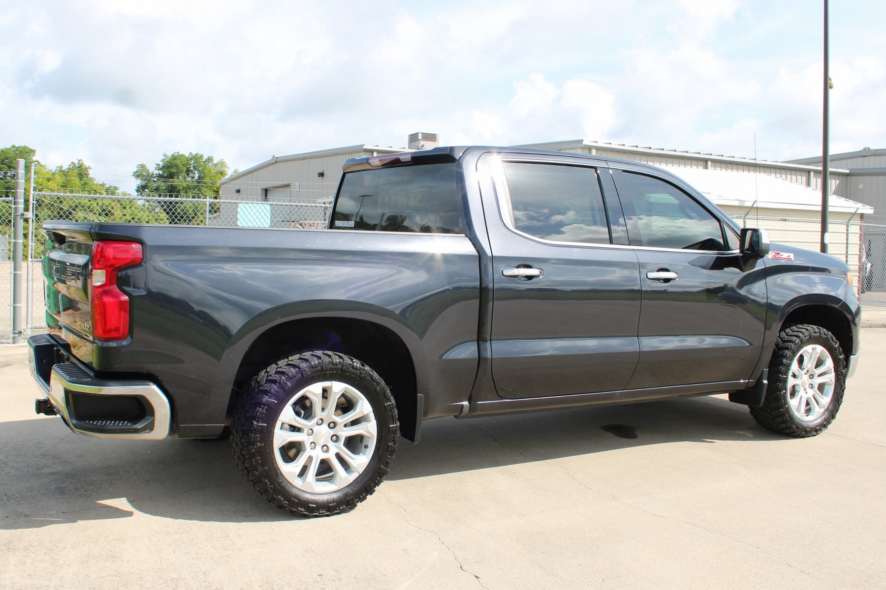 Used 2023 Dark Ash Metallic Chevrolet 4WD Crew Cab 147 LTZ image 32