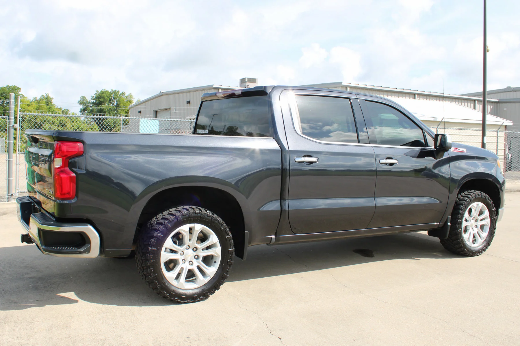 Used 2023 Dark Ash Metallic Chevrolet 4WD Crew Cab 147 LTZ image 32