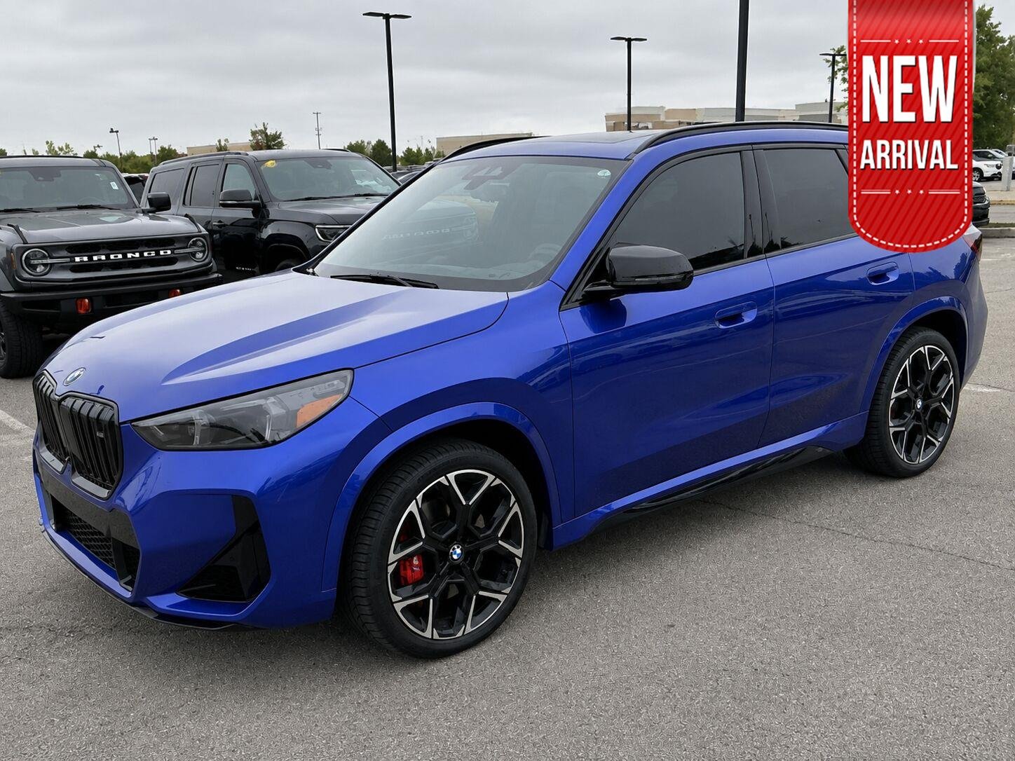 Used 2025 Portimao Blue Metallic BMW M35i image 1