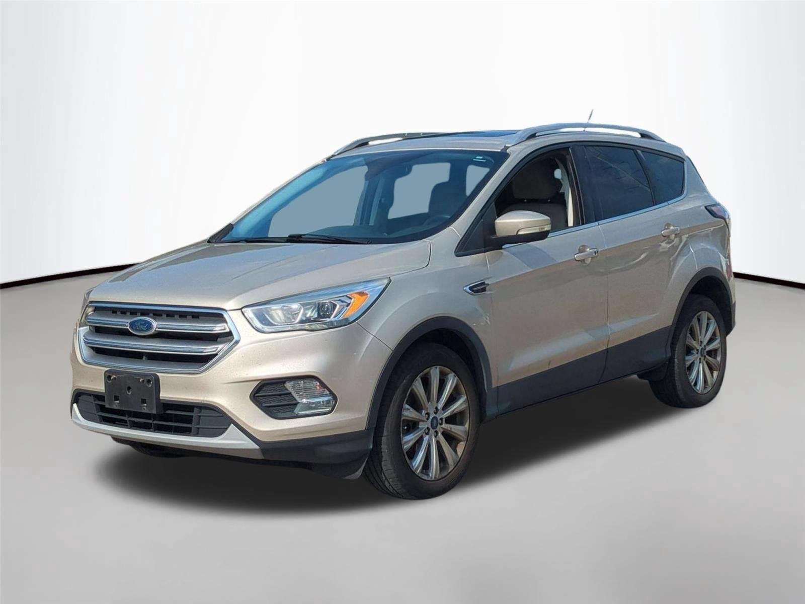 Used 2017 White Gold Metallic Ford Titanium image 1