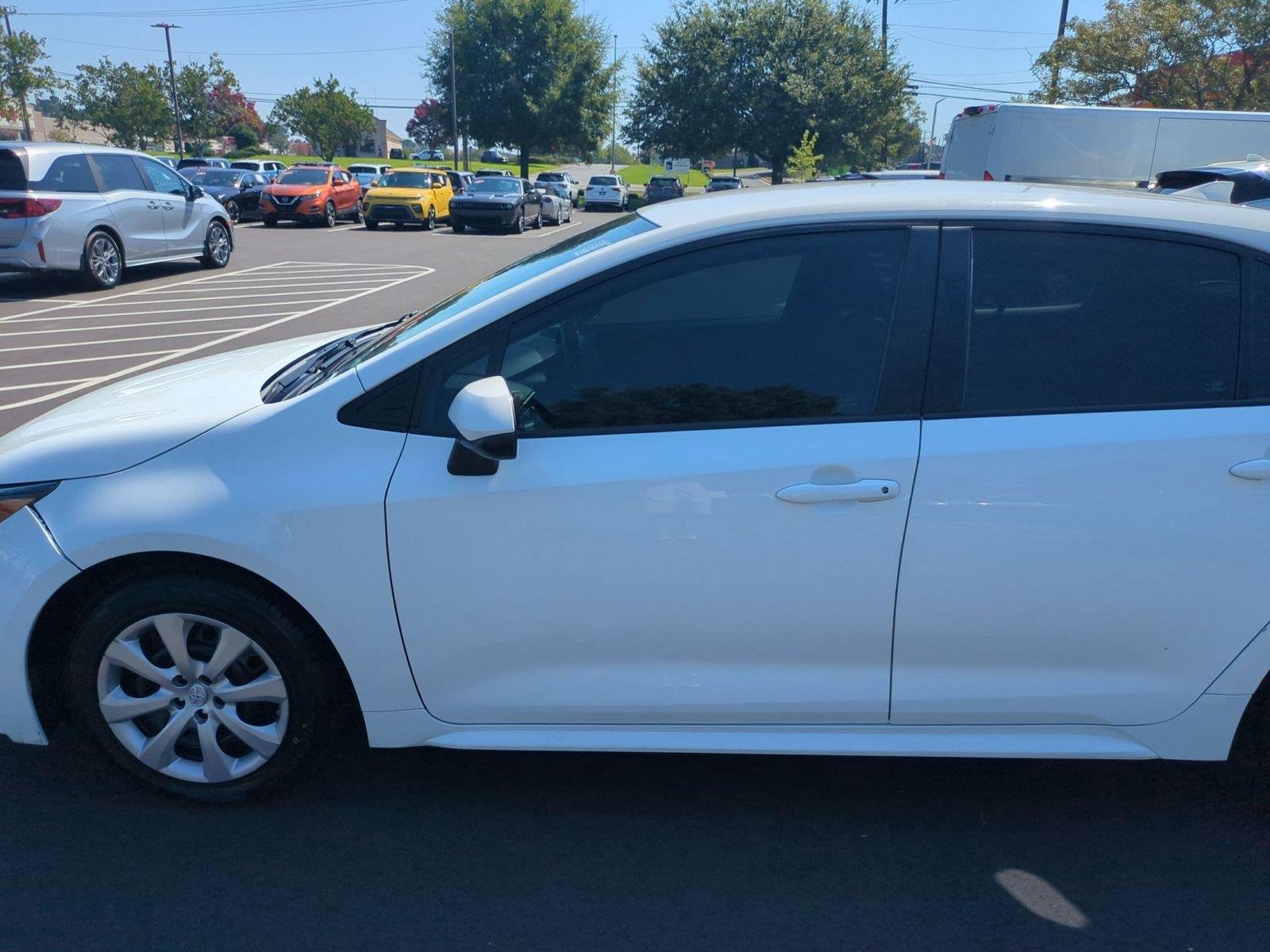 Used 2021 Super White Toyota LE image 15