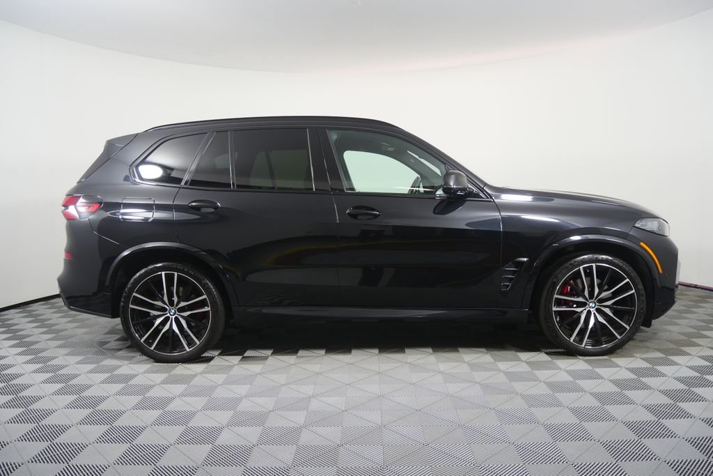 Certified Used 2024 Black Sapphire Metallic BMW xDrive40i image 2