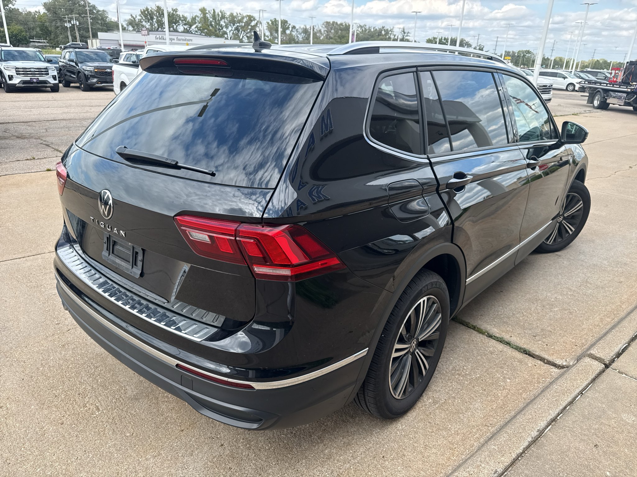 Used 2024 Deep Black Pearl Volkswagen Wolfsburg Edition image 24