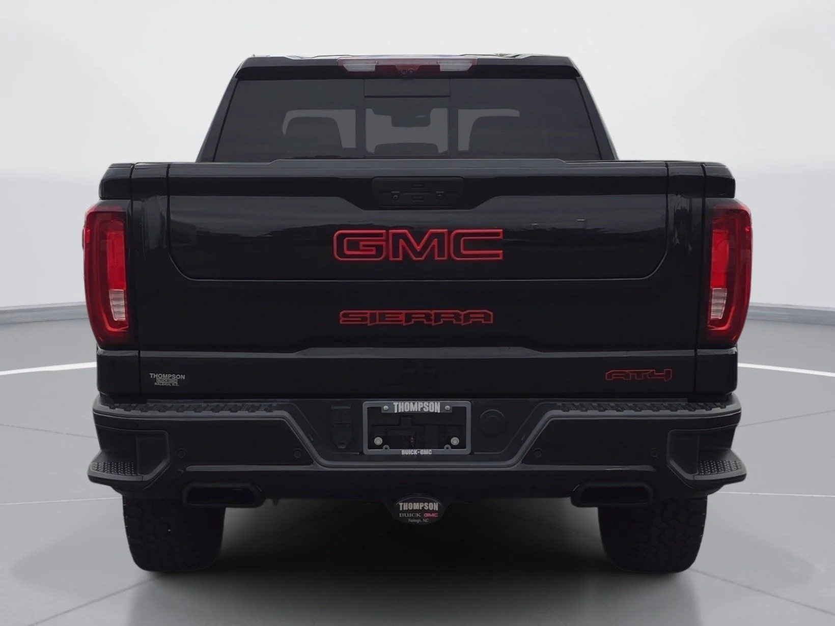 Used 2021 EBONY TWILIGHT METALLIC GMC AT4 image 4