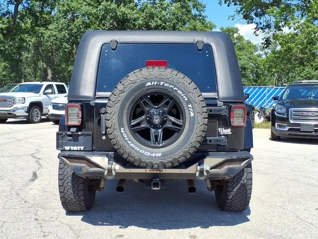 Used 2011 Black Jeep Sahara image 4