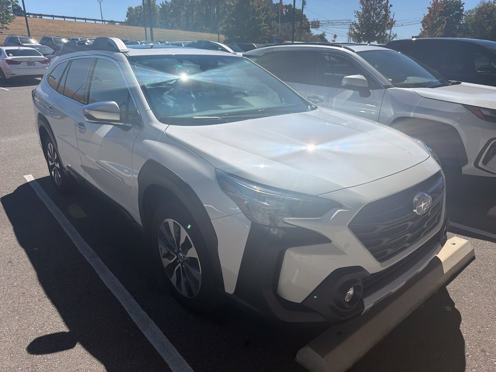 Used 2025 Crystal White Pearl Subaru Touring image 1