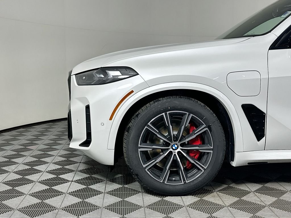 Used 2026 White Metallic BMW xDrive50e image 9