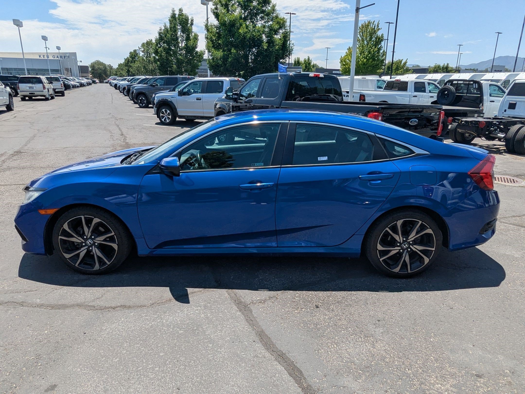 Used 2021 Aegean Blue Metallic Honda Sport image 7
