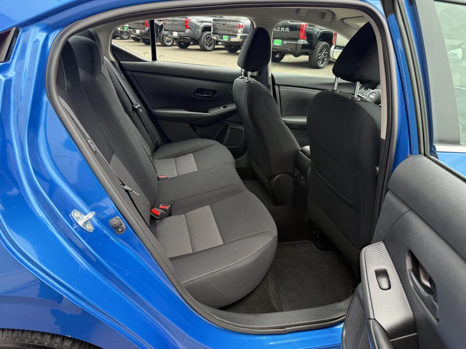 Used 2024 Electric Blue Metallic Nissan SV image 17