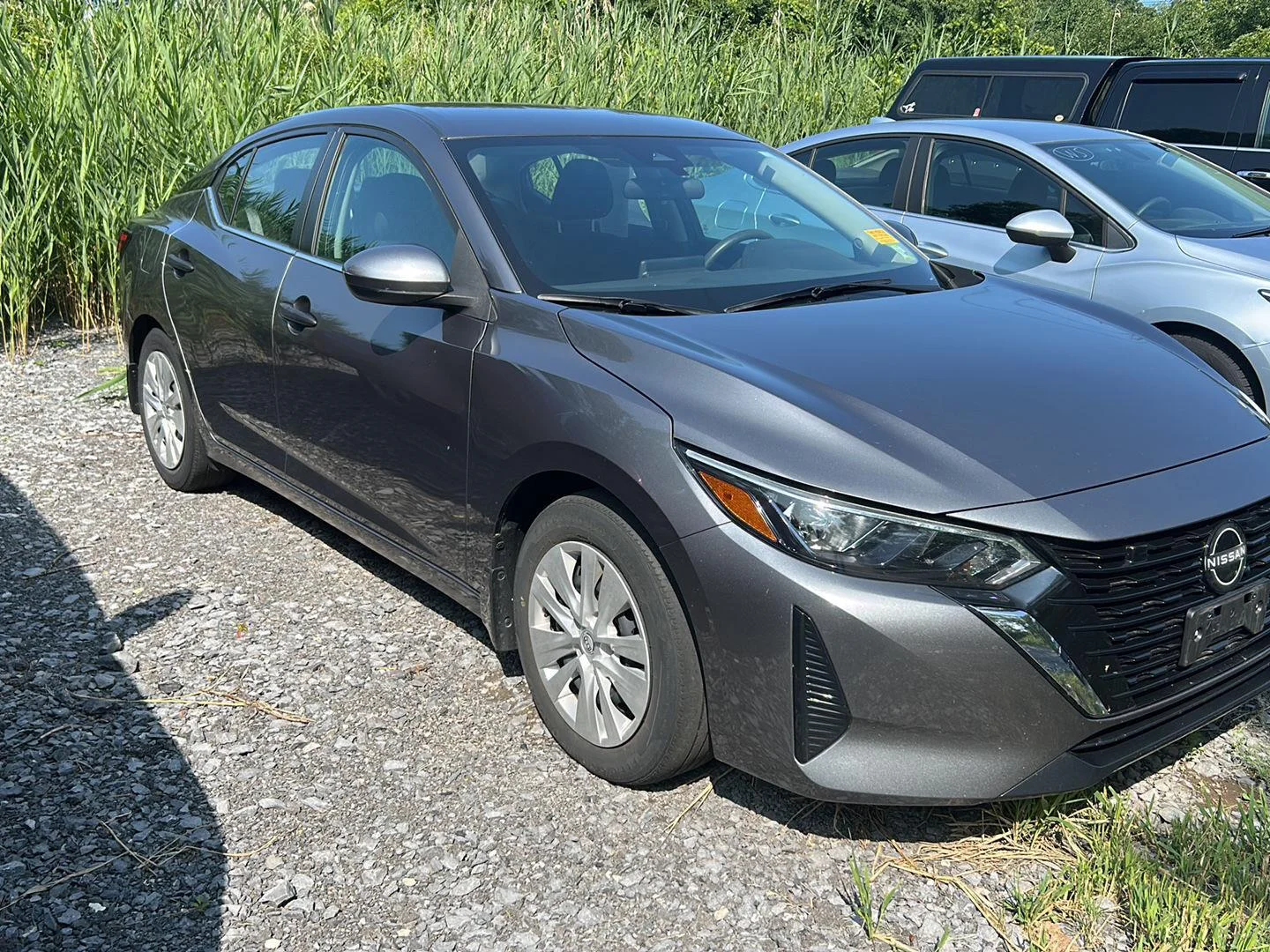 Used 2024 Gun Metallic Nissan S image 2