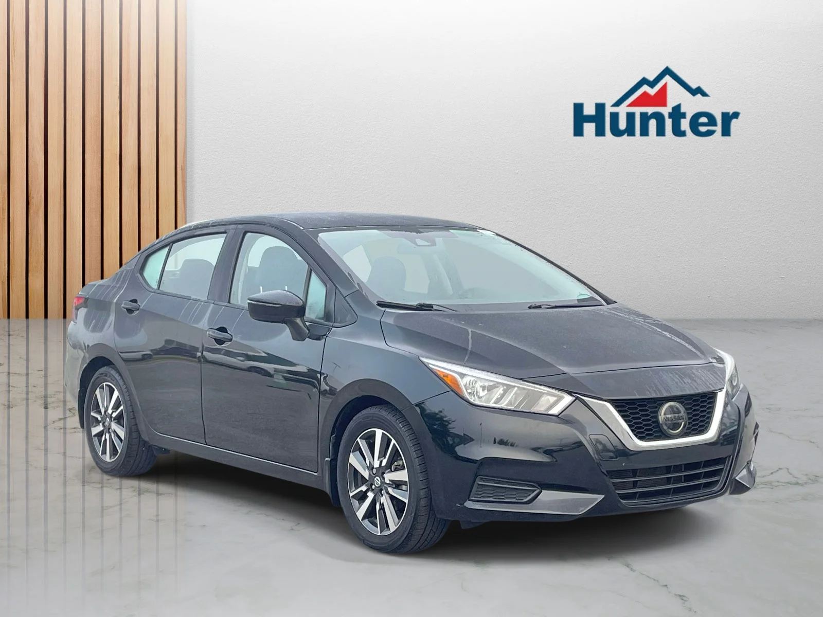 Used 2020 Super Black Nissan SV image 1