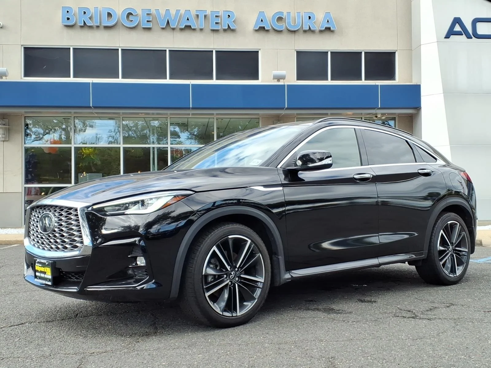 Used 2023 Black Obsidian INFINITI Luxe image 1