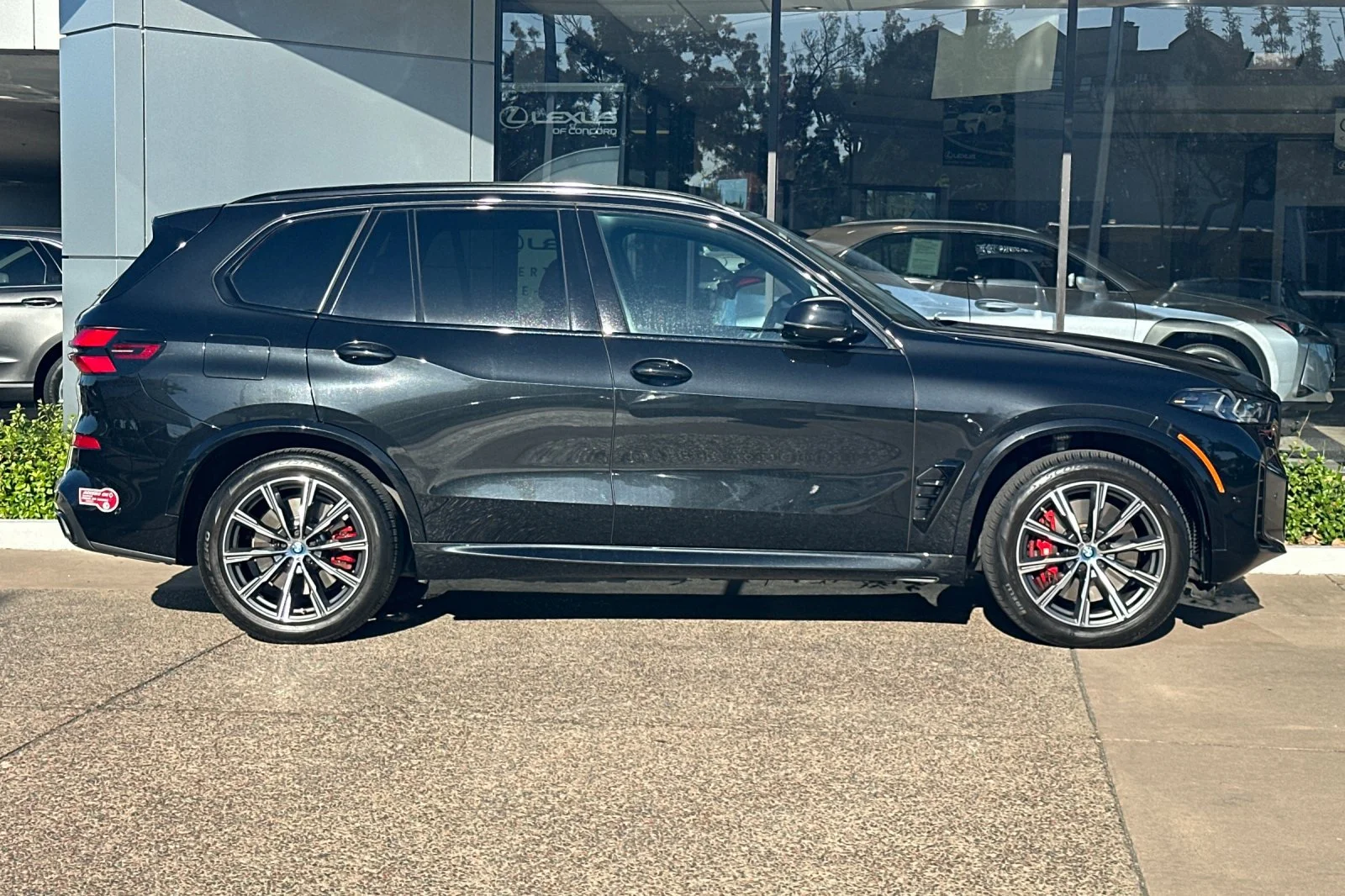 Used 2024 Black Sapphire Metallic BMW xDrive50e image 3