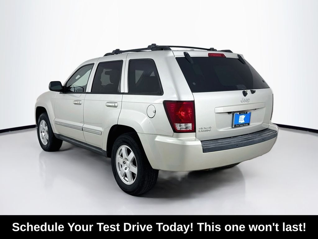 Used 2010 Light Graystone Pearlcoat Jeep Laredo image 5