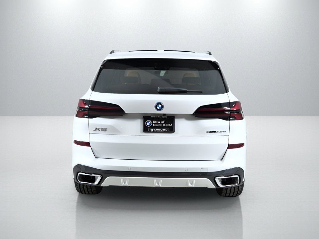 Used 2026 Mineral White Metallic BMW xDrive50e image 11
