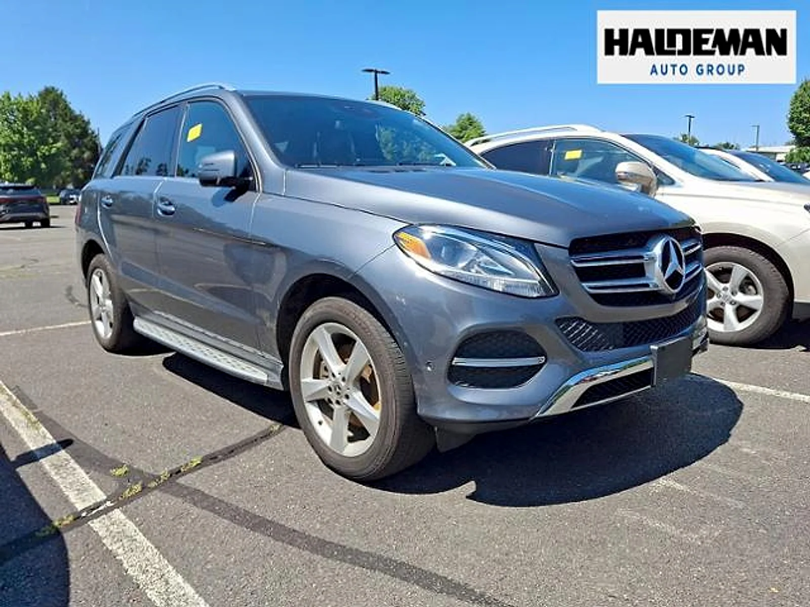 Used 2017 Gray Mercedes-Benz 4MATIC® image 1