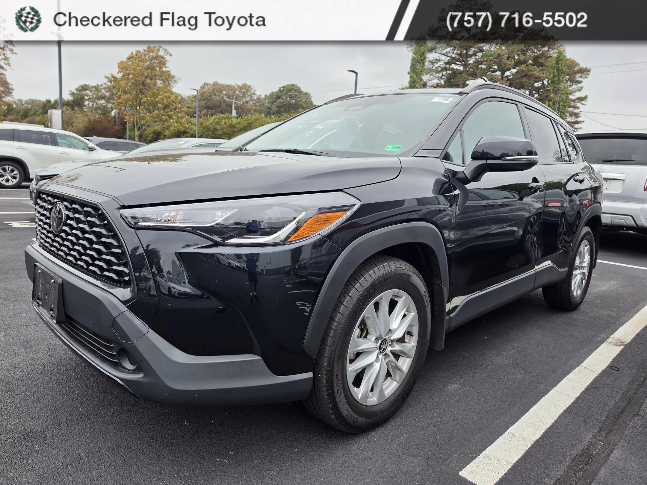 Used 2024 Jet Black Toyota LE image 1